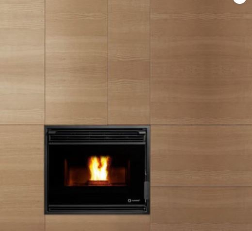 Ecoforest Cordoba: built-in pellet fireplace in a wood wall