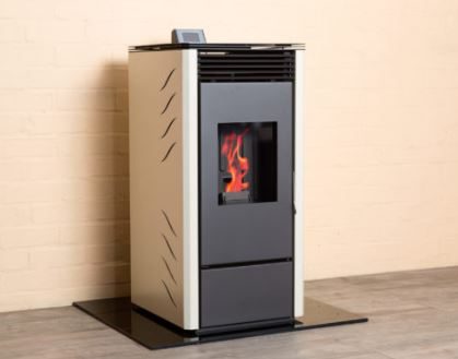 Victoria pellet stove with ivory side panels, alight, on a glass floor plate